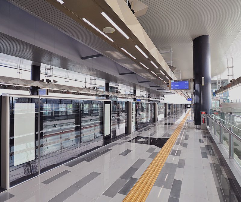 a large long train on a train platform