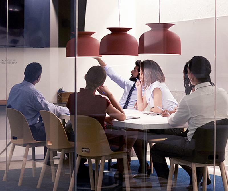 a group of people sitting at a table