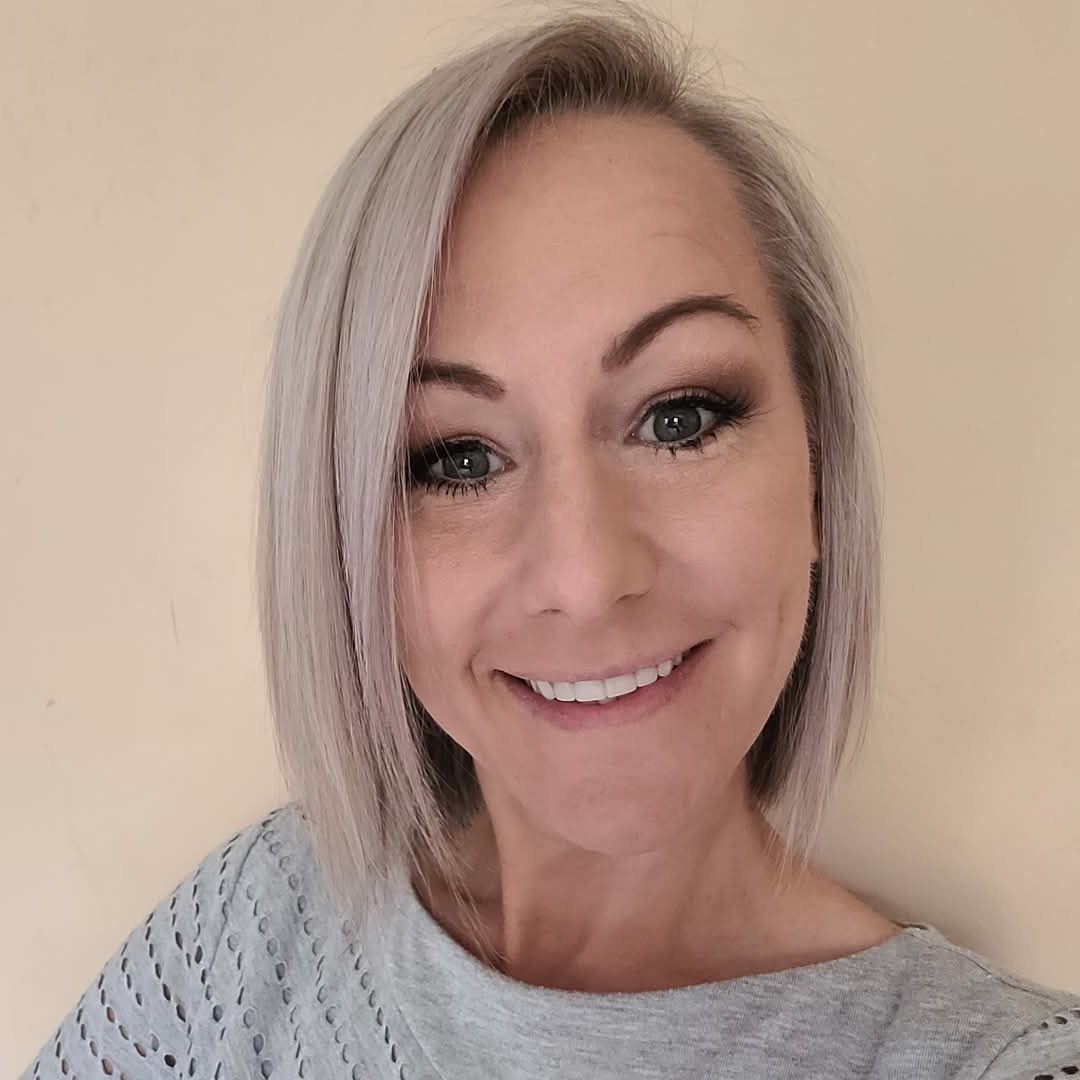 a woman smiling for the camera